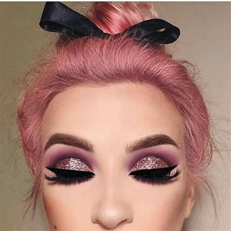 Pink hair and glittery pink eye makeup are perfect for each other ...