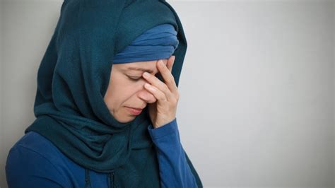 Premium Photo | A sad muslim woman in a hijab, crying.