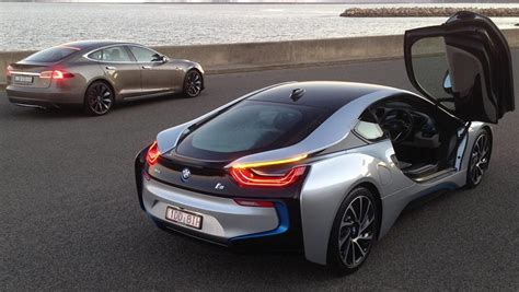 BMW i8 vs Tesla Model S 2015 review | hybrid vs electric | CarsGuide