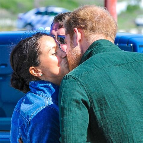 Meghan Markle and Prince Harry Kiss During Royal Tour of Africa