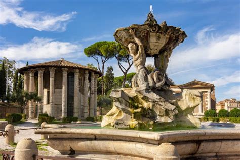 Fountain of Tritons and Temple of Hercules Victor in Rome, Italy Stock ...