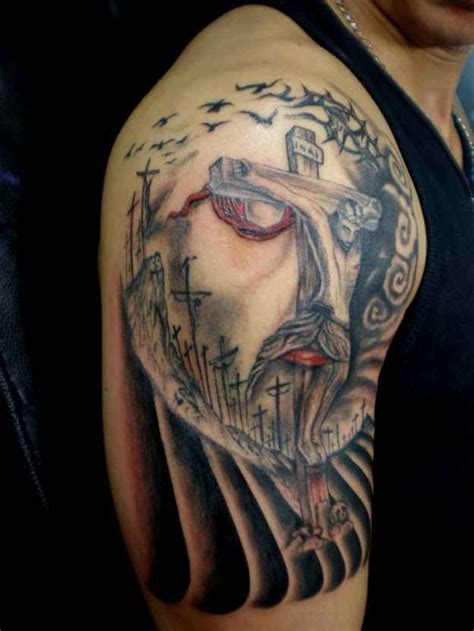 Awesome crucifixion of jesus tattoo on shoulder - Tattooimages.biz