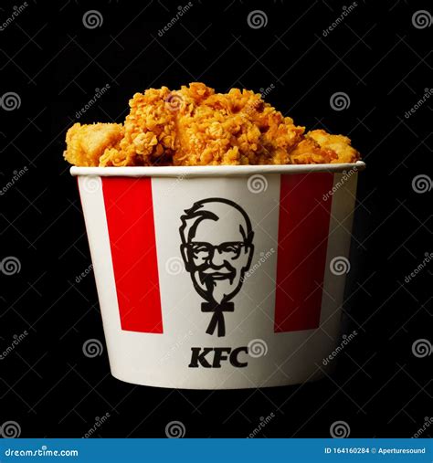 A Lots of KFC Chicken Hot Wings or Strips in Bucket of KFC Kentucky ...