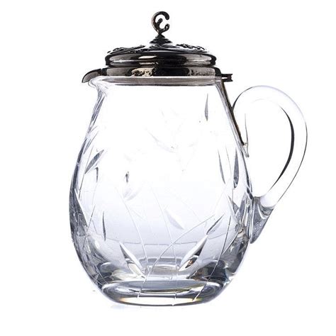 Pitcher in glass with lid in silver