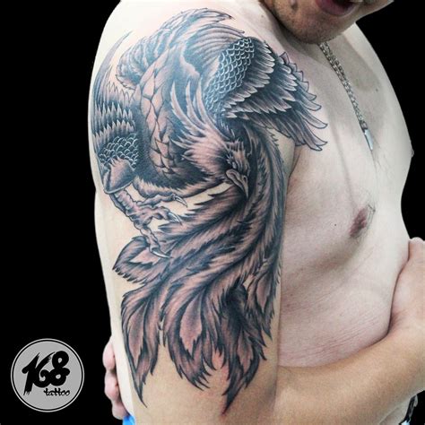 Phoenix tattoo in black and grey | Phoenix tattoo, Black tattoos, Black ...