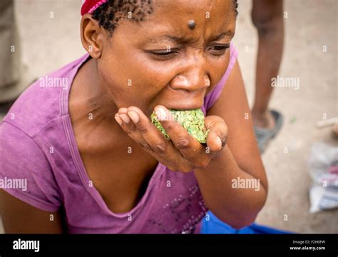 San people making food and eating it in Botswana, Africa Stock Photo ...