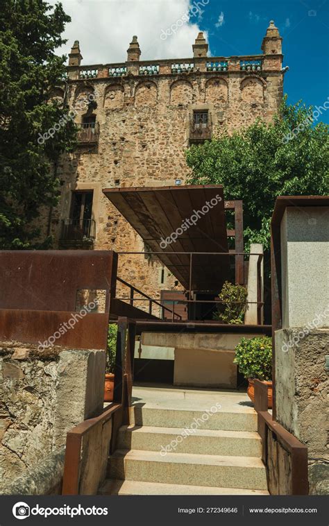 Old building and modern gardens of the Caceres Museum. – Stock ...