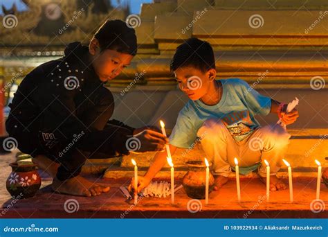 Unidentified Burmese Boys Fire Candles in Buddhist Temple during ...