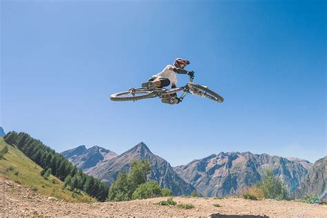 "Man Performing Midair Stunts With Mountain Bike" by Stocksy ...