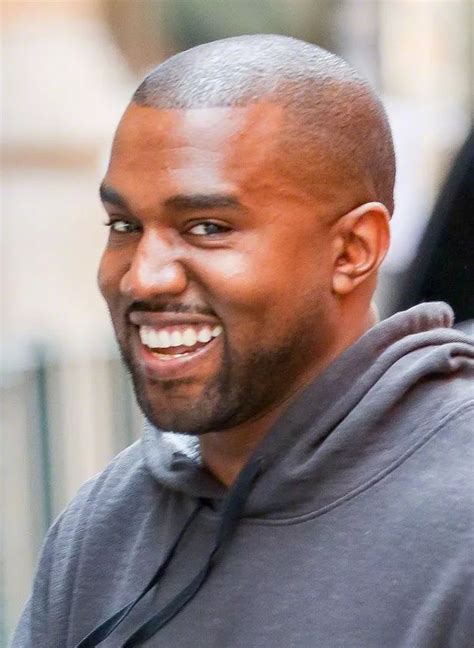 Wedded bliss? Kanye West pictured SMILING for possibly the first time ...