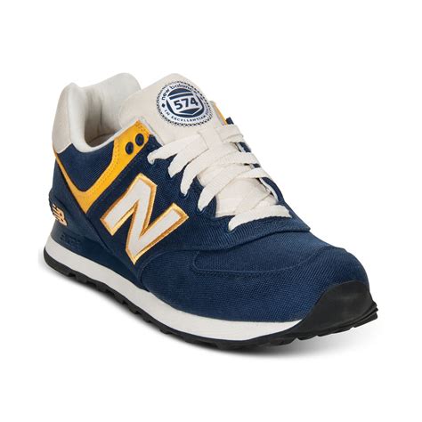 New Balance 574 Sneakers in Blue for Men (NAVY/YELLOW) | Lyst