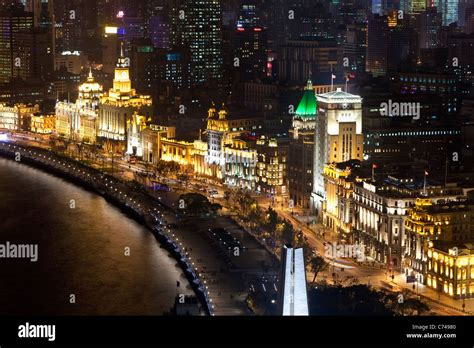 Shanghai night skyline (view along Huangpu River and the Bund ...