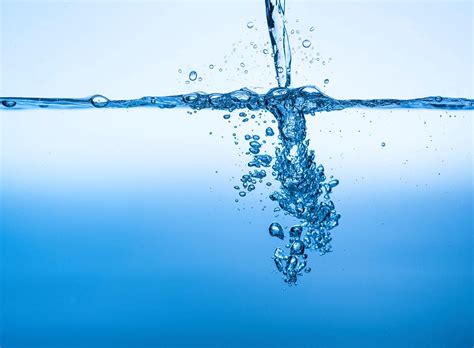 Water pouring into a body of water - StockFreedom - Premium Stock ...