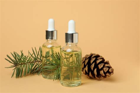 Premium Photo | Aromatherapy concept with pine oil on beige