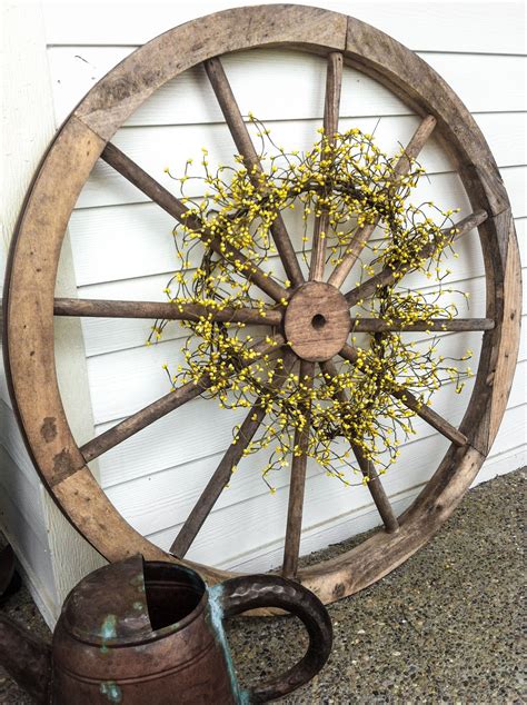 Decor: Old wooden wagon wheel. | Wagon wheel decor, Wheel decor, Wagon ...