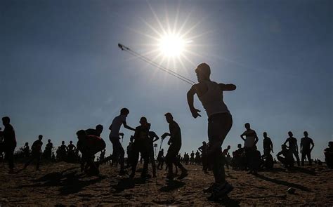 Thousands protest at Gaza border, over 100 said injured amid riots ...