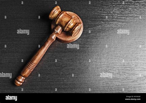 Judge's Gavel over black background Stock Photo - Alamy