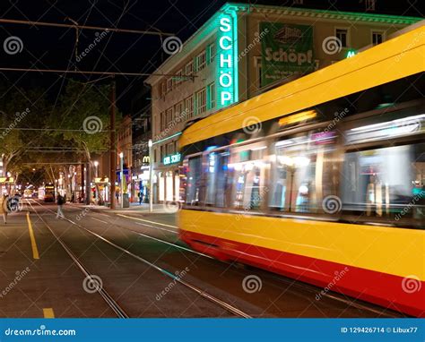 Tram in the city at night editorial stock image. Image of urban - 129426714