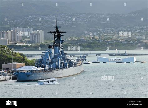 The USS Missouri (BB-63) rests at berth in Pearl Harbor near the USS ...