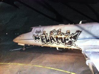 Graffiti on private jet at Van Nuys Airport (LA) - damage estimated at ...