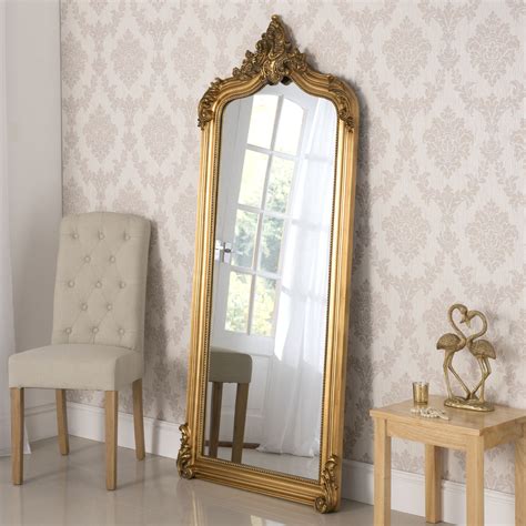 YG136 gold full lenght leaner mirror. A decorative arched top swept ...