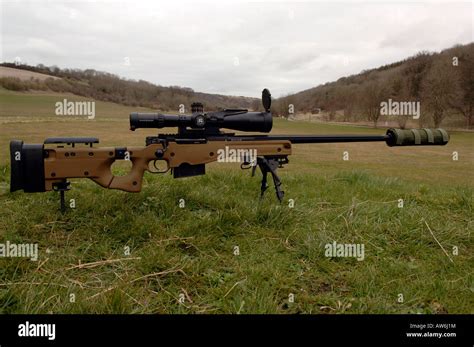 British Infantryman with a long range sniper rifle L115A3 which has a ...