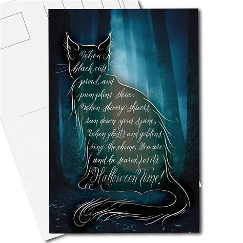 A lifestyle top view of the Halloween calligraphy postcard Black Cat ...