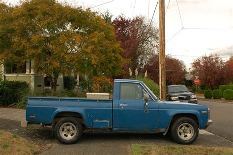 OLD PARKED CARS.: 1974 Mazda REPU.