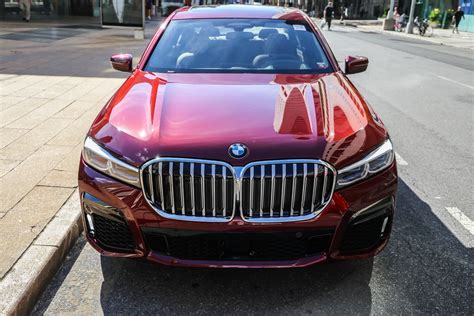 The new BMW 750i Facelift shines in the beautiful Aventurine Red color