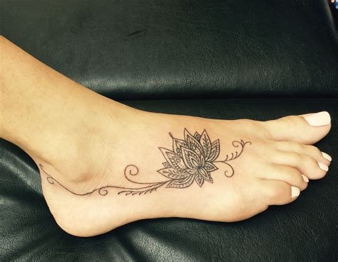 Lotus flower foot tattoo | Tattoo designs foot, Small foot tattoos ...