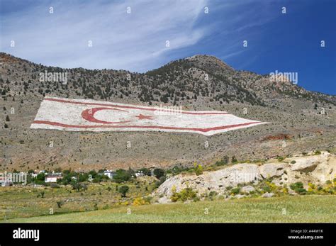 The Turkish Republic of Northern Cyprus flag on the hillside above ...