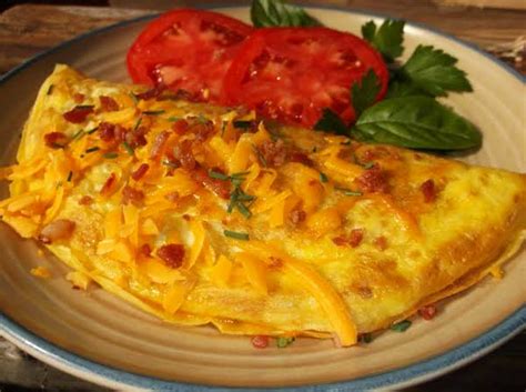 Bacon Cheddar Ham Omelette Recipe | Just A Pinch Recipes