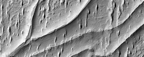 NASA spacecraft snaps image of ancient, winding rivers on Mars