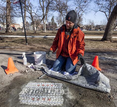 Photos: Pothole art -- Chicago Tribune