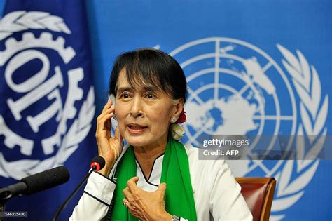 Myanmar democracy icon Aung San Suu Kyi attends a press conference ...