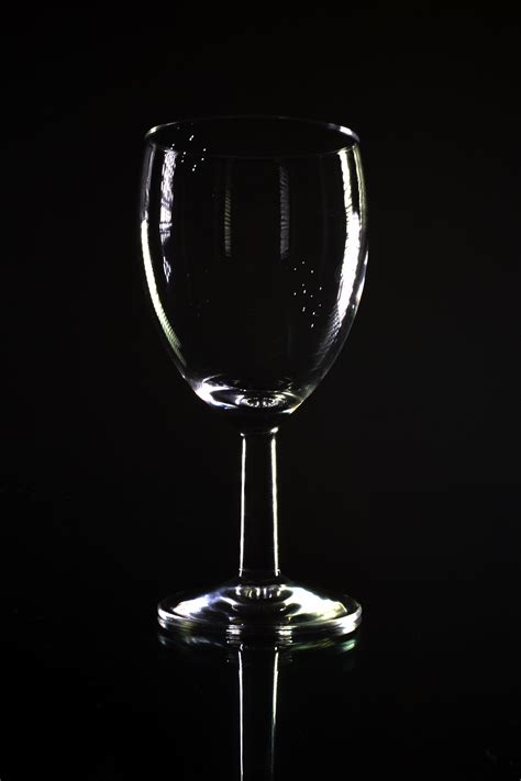 Stock Photo of Empty Wine Glass Shape Outlined with Black Background ...