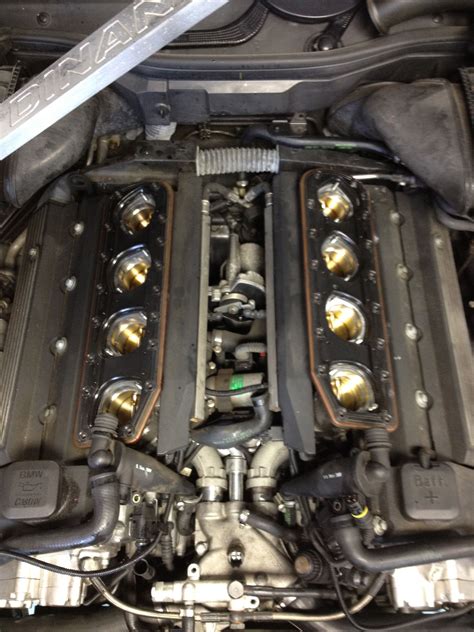 BMW E39 M5 4.9l V8 with engine cover off exposing the 8 individual ...