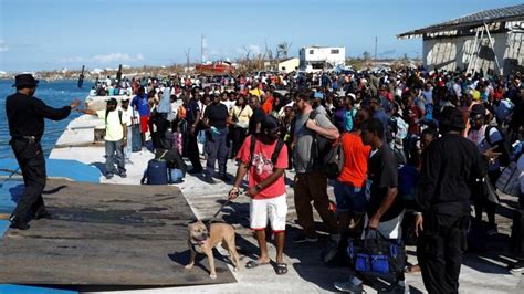 People get in a ferry at the Marsh Harbour Government Port on the Abaco ...