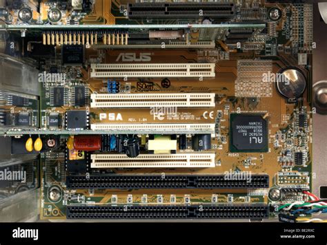 AGP and PCI slots on a motherboard of PC Inside Computer With AGP slot ...