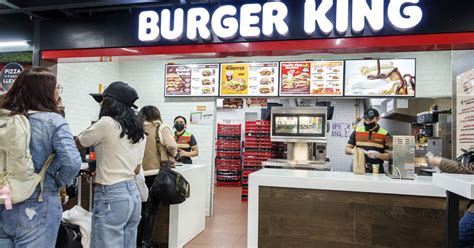 Burger King owner Restaurant Brands buys chain's largest U.S. franchisee