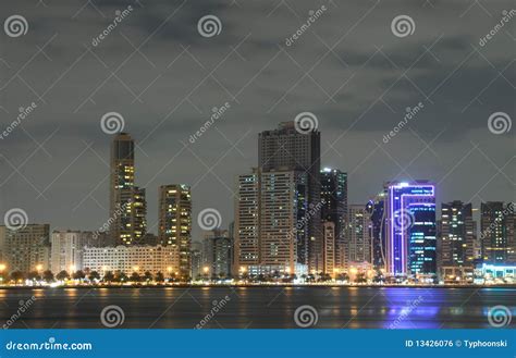 Sharjah City Skyline at Dusk Stock Photo - Image of sharjah ...