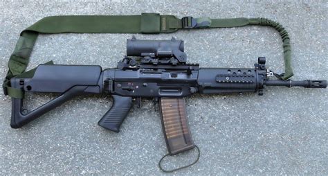 Gun-Gallery — Sig SG 553/1 - 5.56x45mmLoading that magazine is a pain ...