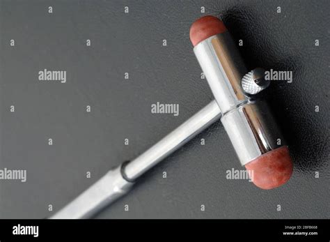 Patella reflex hammer Stock Photo - Alamy