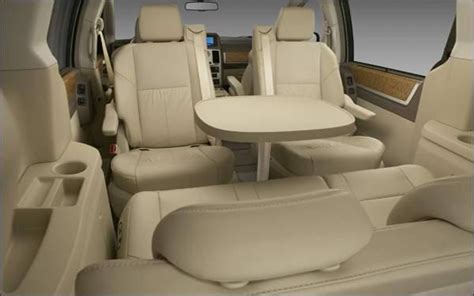 Minivan With Table And Swivel Seats | Brokeasshome.com