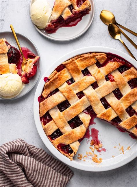 two plates with pies and ice cream on them