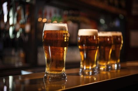 Premium AI Image | Draught beer in glasses on blurred background of ...