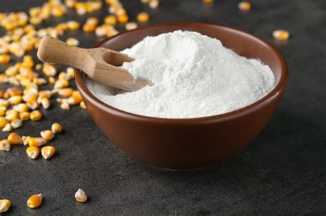 Bowl with corn starch and kernels on table - A Best Fashion