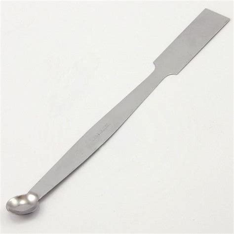 This stainless steel spatula and spoon combination (like a scoopula) is ...