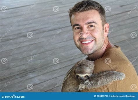 Sloth Hugging a Handsome Man Stock Image - Image of happy, animal ...