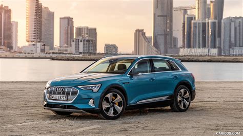 2019 Audi e-tron (Color: Antigua Blue) - Front Three-Quarter | Caricos